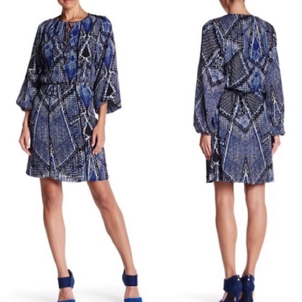Parker v-neck front tie dress with all over print . Size medium